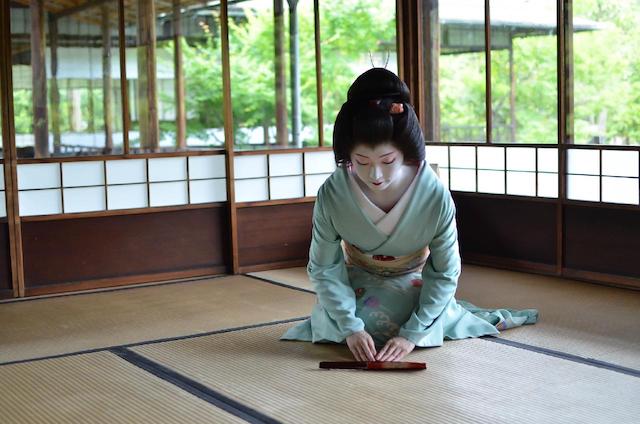 Sitting on floor in Japan Maiko Geisha tatami floor