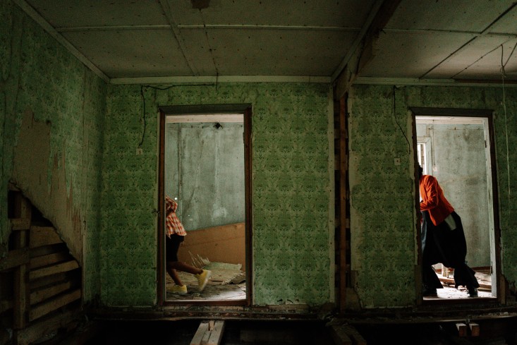 haunted house scared visitors running away from terrifying monsters inside haunted house