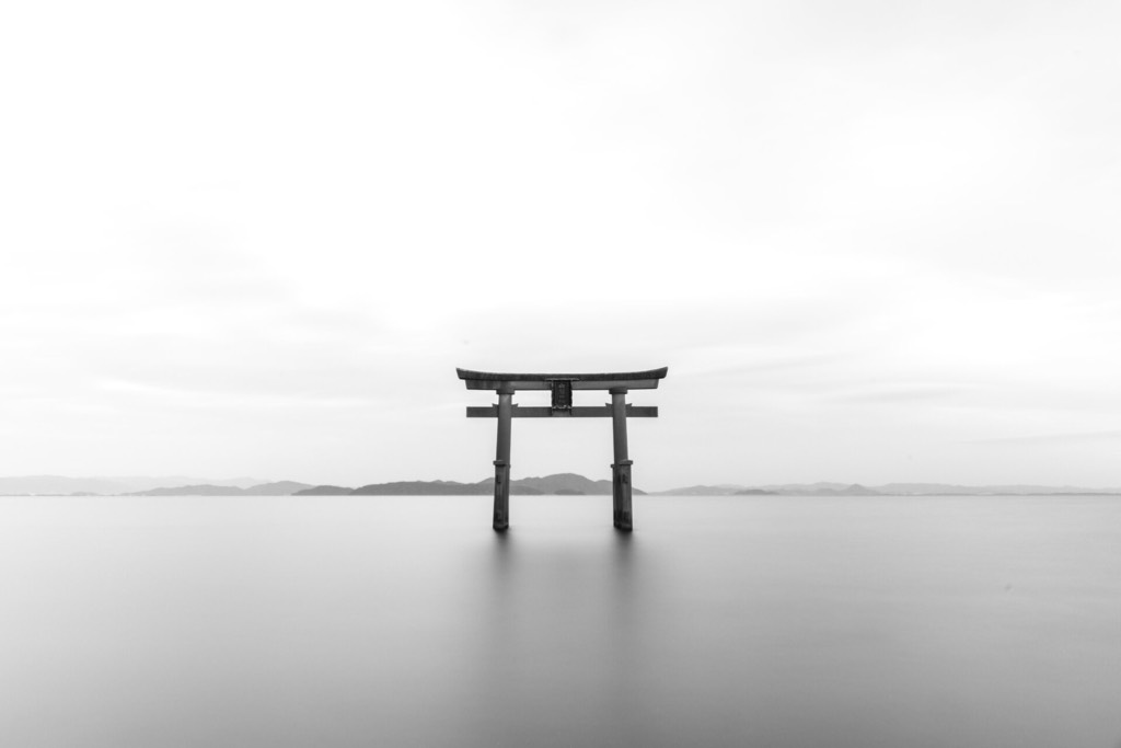 Watching Torii gate in the ocean
