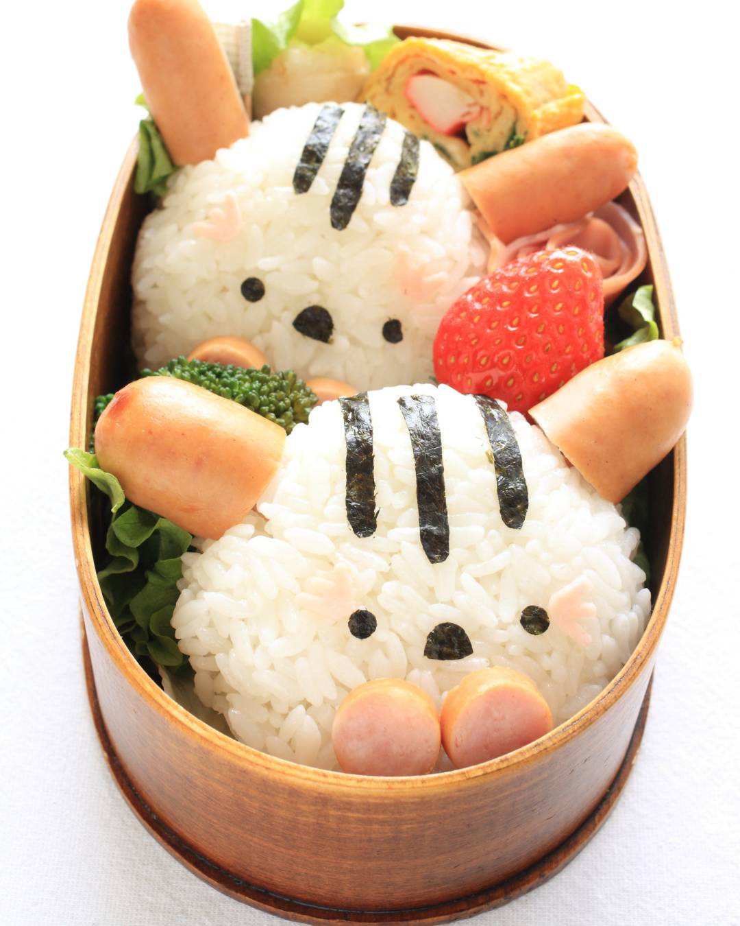 Bento Box 1 Kyara-ben with rabbit shaped onigiri - sausages for ears, and seaweed used to create face
