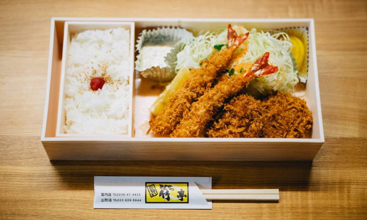 Bento Box 4 Fancy wooden bento box with fried shrimp, rice, and more