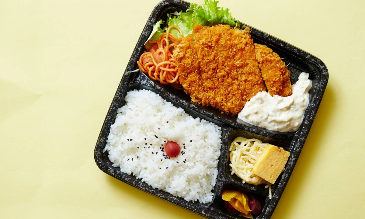 Bento Box 5 Bento box with fried pork cutlet (tonkatsu), rice, egg, and various vegetables