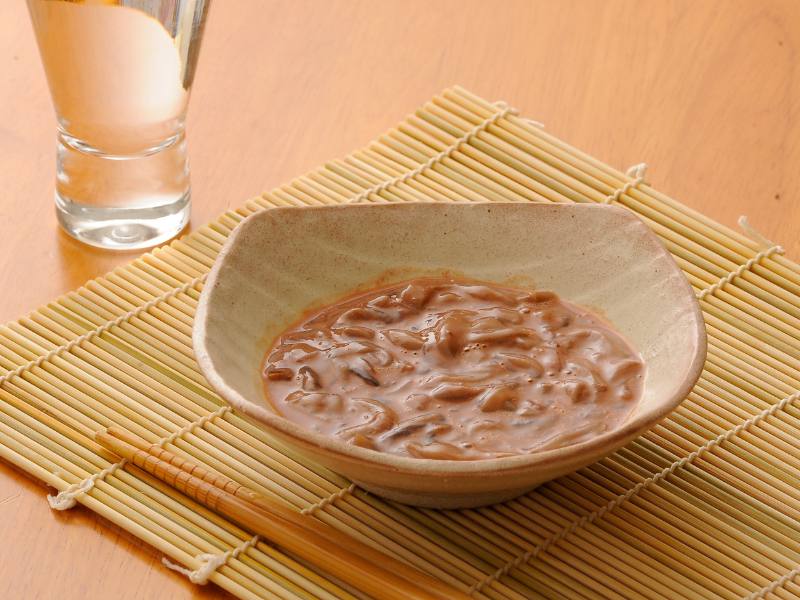 konowata konowata in a white bowl on a table
