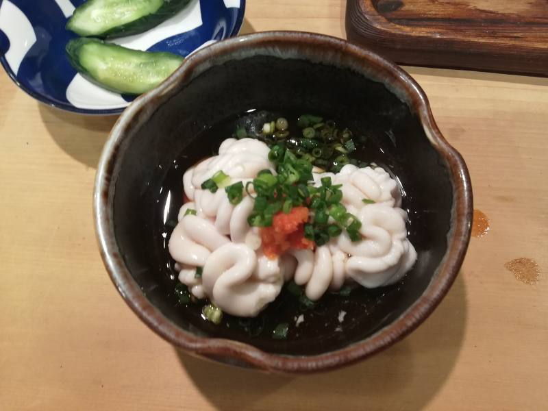 weird japanese foods 4 shirako in a brown bowl, one of the weird japanese foods