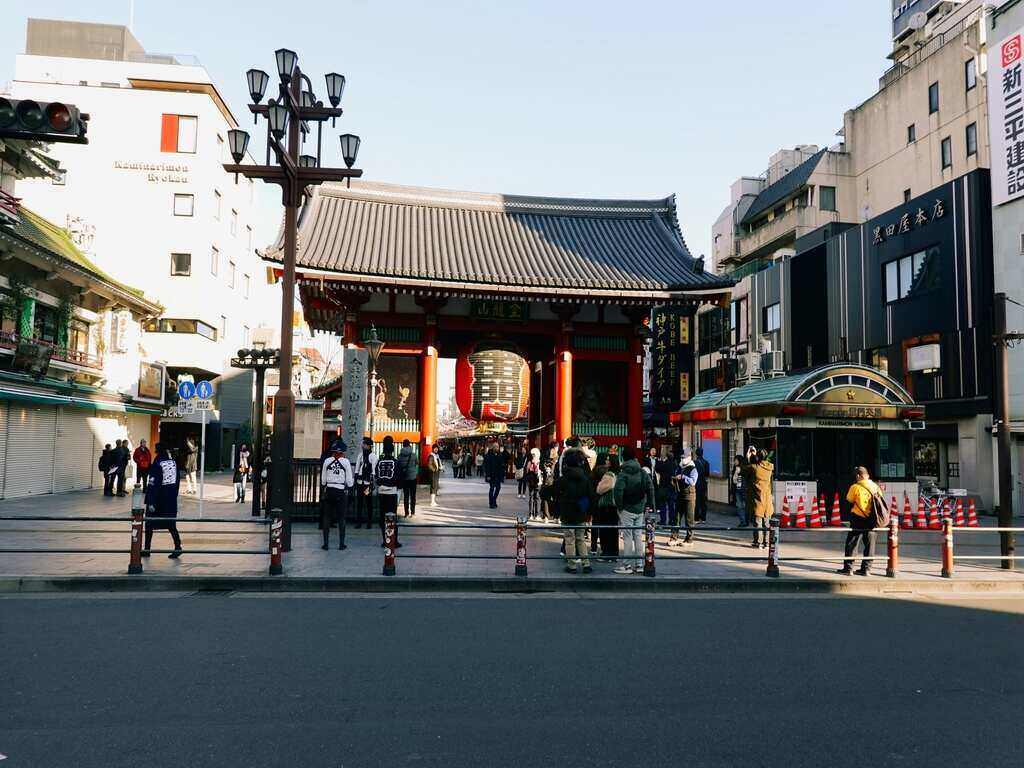 A scene from Asakusa town. Kaminarimon symbol is captured in the middle of the photo.